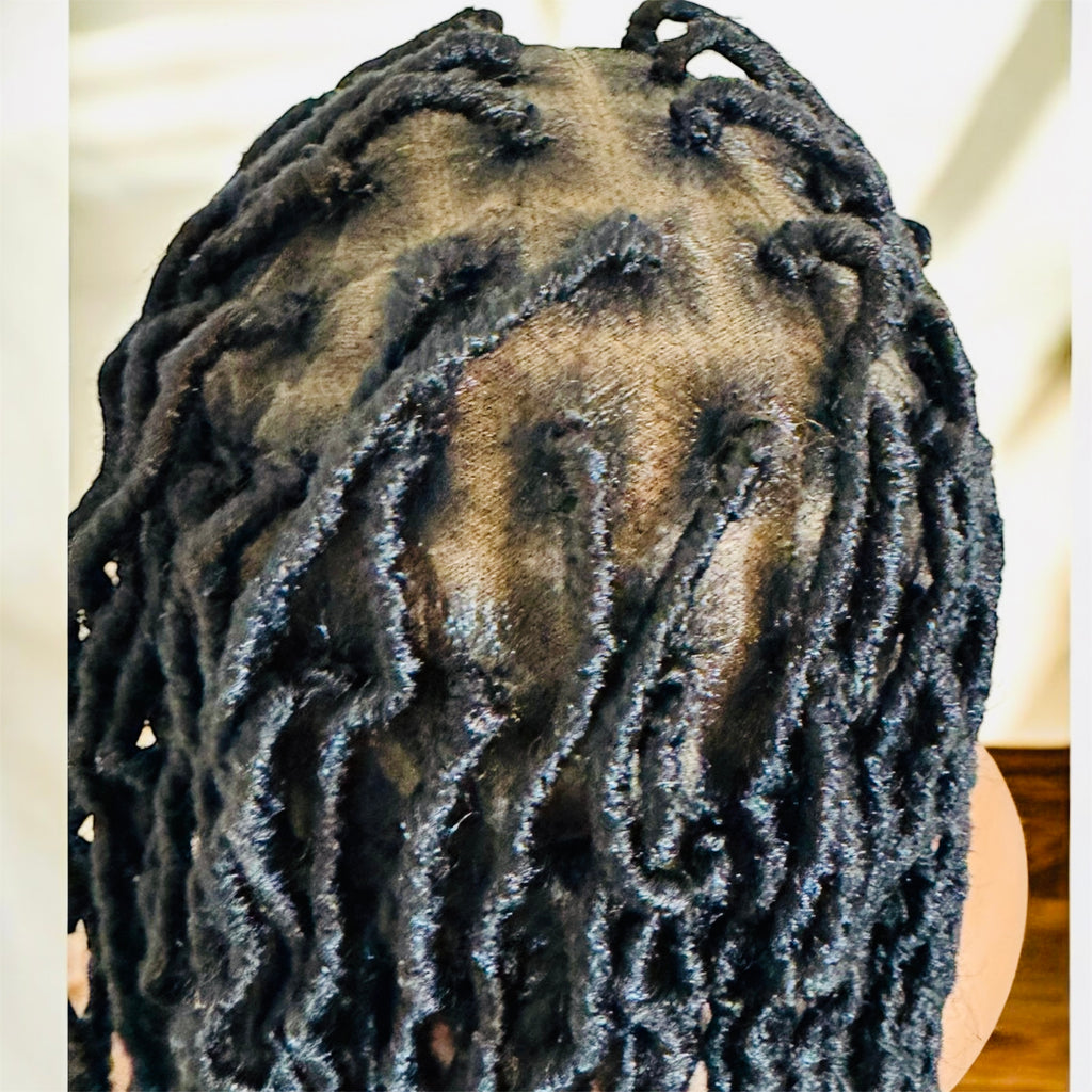 40 inches Faux locs  . Full lace  frontal and knottless African style .