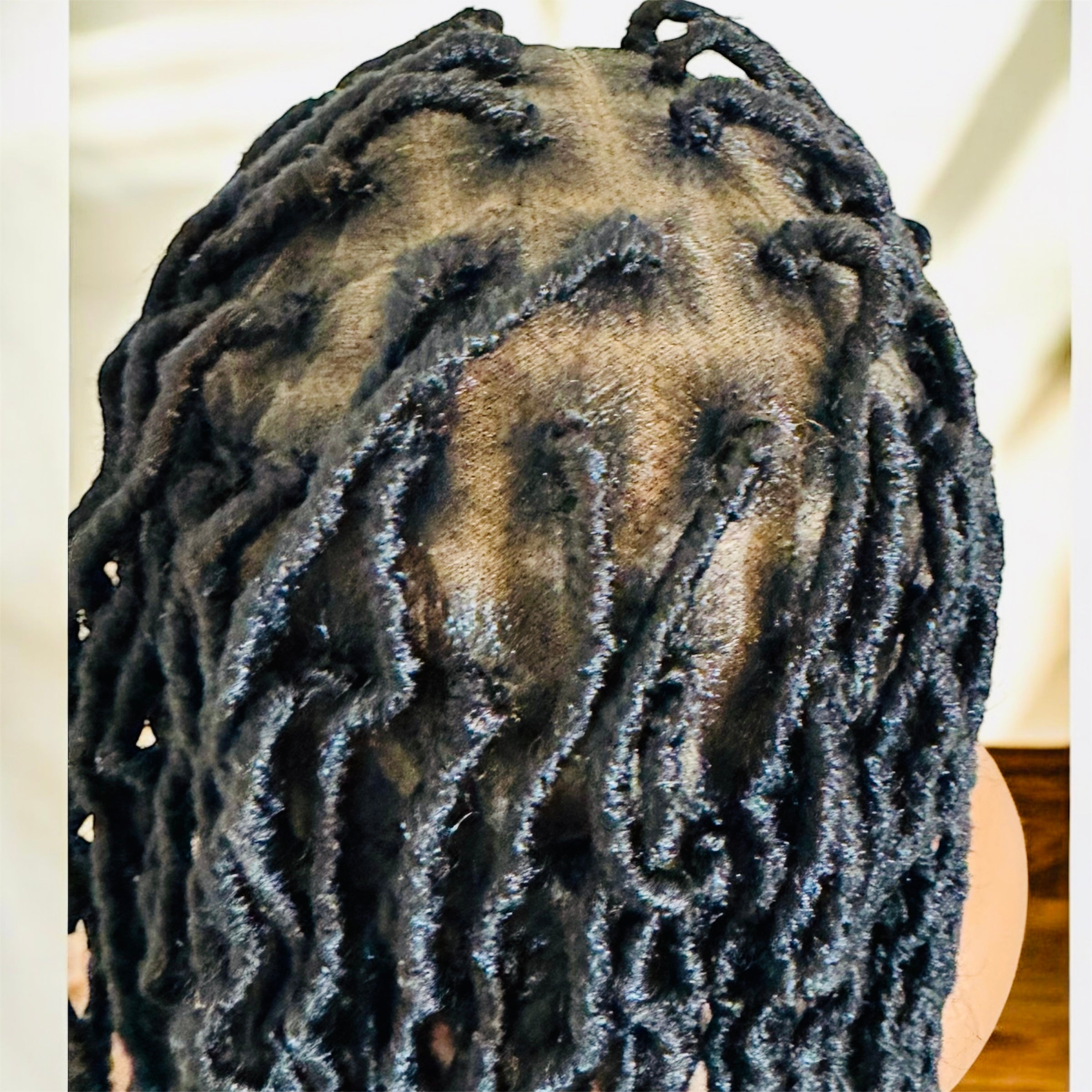 40 inches Faux locs  . Full lace  frontal and knottless African style .