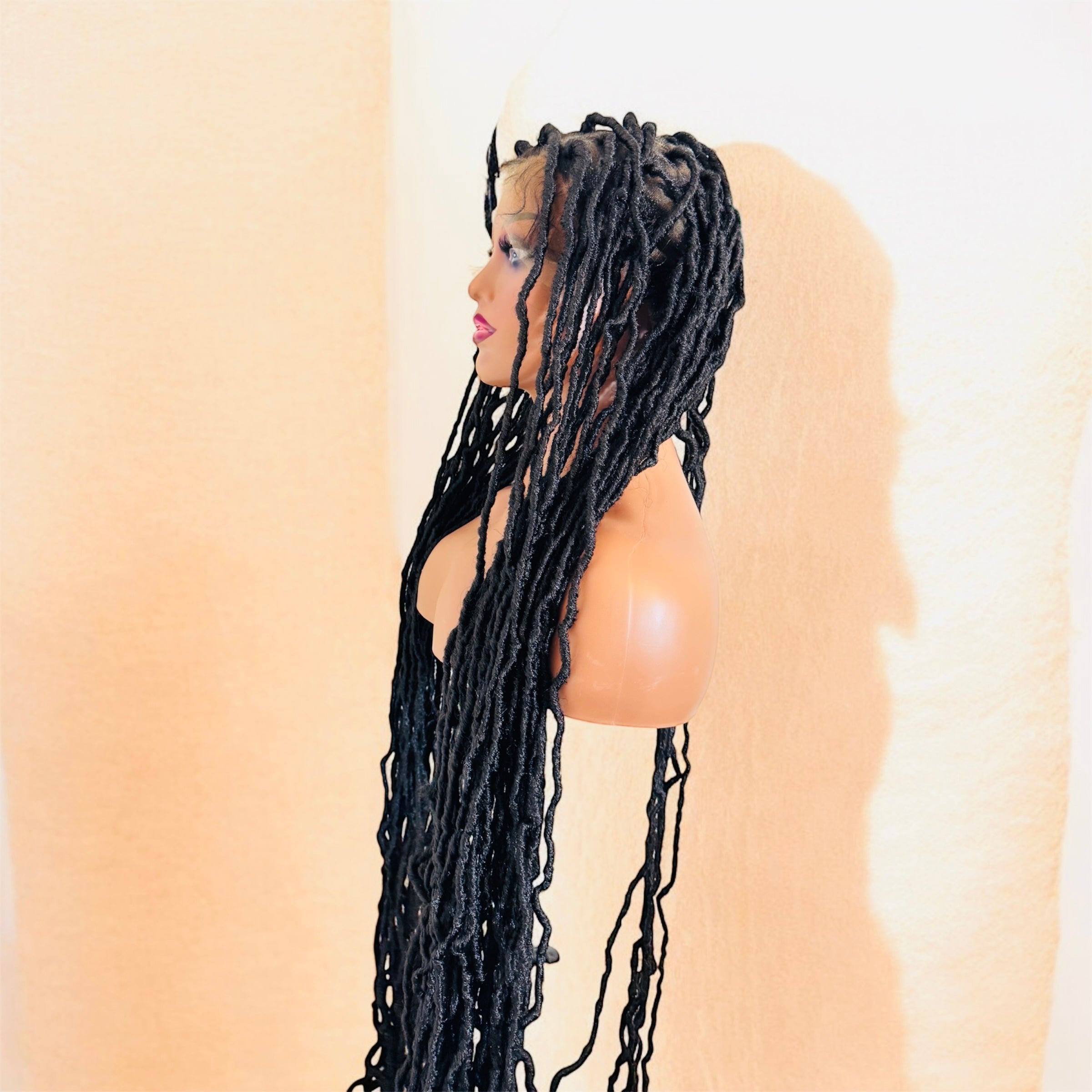 40 inches Faux locs  . Full lace  frontal and knottless African style .