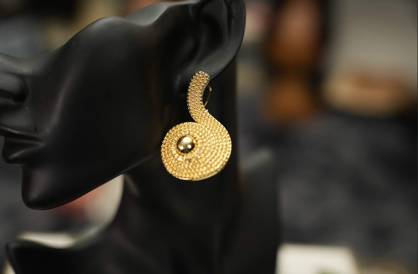 Nwom gold earrings