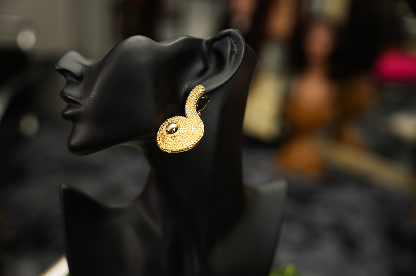 Nwom gold earrings